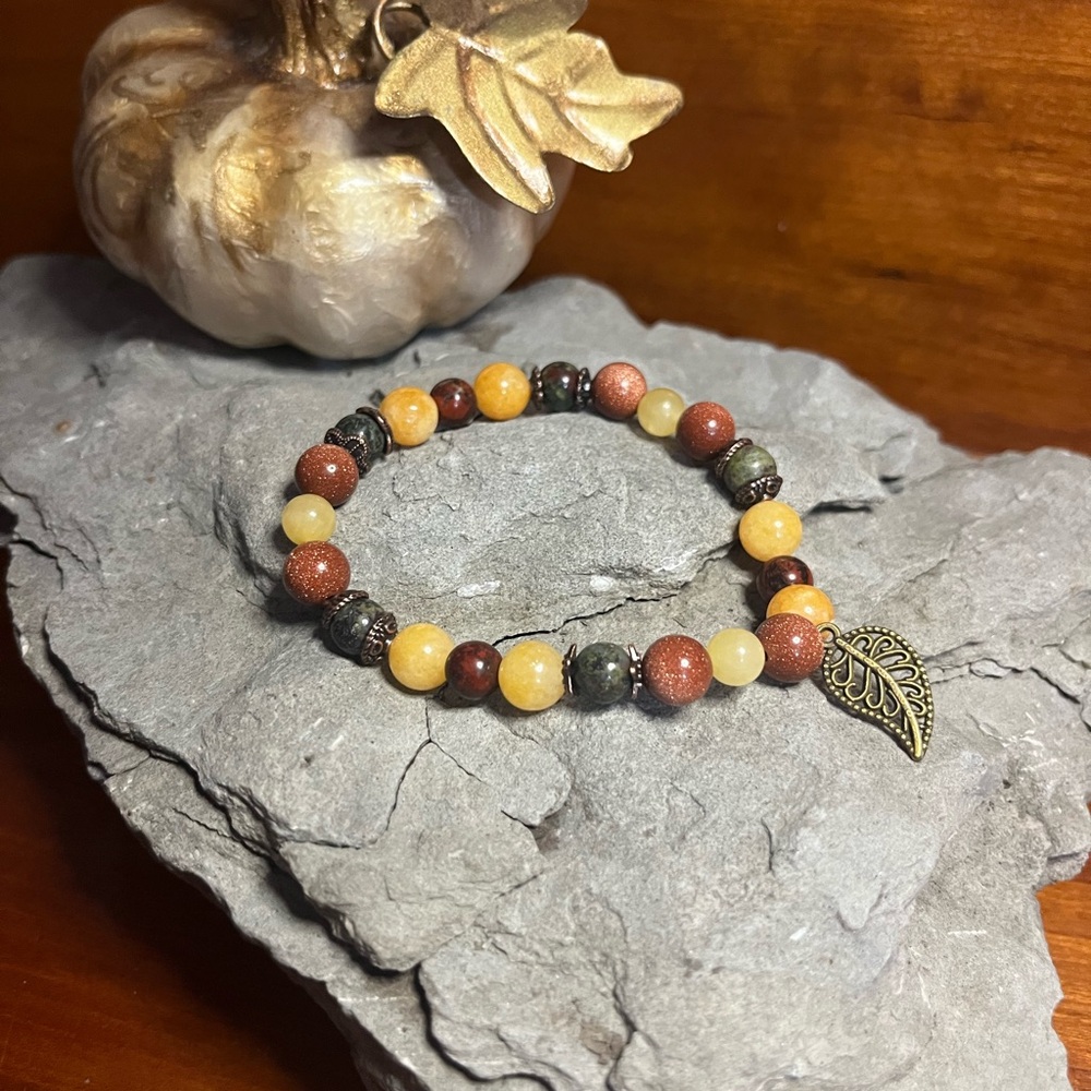Elegant Beaded Bracelet with Leaf Charm